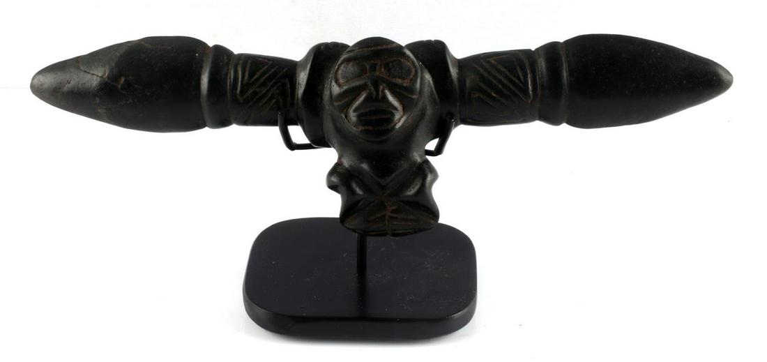 PRECOLOMBIAN TAINO FROG DOUBLE ENDED VOMIT SPATULA: Doubled ended vomit spatula with full figure Anthropic figure in center. Winged Shaman or bat man. Feet turn inward and hands rest next to head. Typical frog head brow. A beautifully conceived and aes
