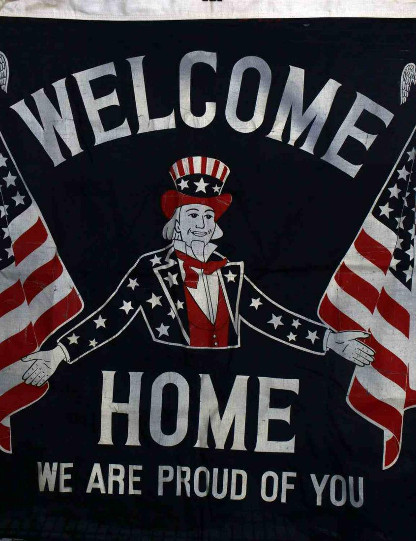 WWII U.S. PATRIOTIC UNCLE SAM WELCOME HOME FLAG: WWII U.S. Patriotic Uncle Sam welcome home flag. Reads "Welcome home we are proud of you" referring to the soldiers returning home from WWII. Measures 34 X 37 inches. Overall, very nice shape and cond