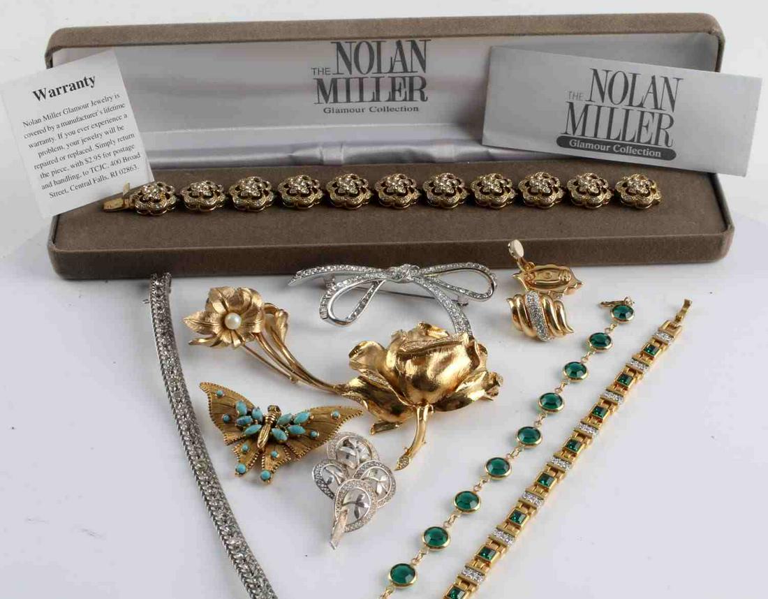 VINTAGE DESIGNER COSTUME JEWELRY JBK MILLER LC: Designer pieces by Nolan Miller brooches and bracelet (7 3/4 inch), Krementz bracelet (7 1/2 inch), Swarovski clip on earrings and bracelet (7 inch), JBK bracelet (7 inch), Florenza butterfly brooch,