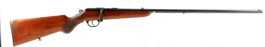 BSW GERMAN MODEL 315 BOLT ACTION RIFLE .22 CAL: Berlin-Suhler Waffen (BSW) bolt action rifle in .22 caliber, blued steel and wood stock. Maker and model marked to top of chamber, Fluss-Stahl Krupp-Essen marked to 25 inch barrel, along with Flobert 