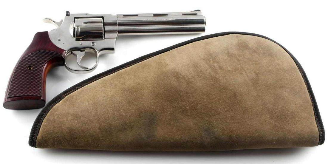 COLT PYTHON .357 MAGNUM 6 INCH BARREL REVOLVER: Stainless S/N E85016 dates it 1975, has powder residue in rear barrel, otherwise clear clean bore, full finish, wood checkered grip. No International shipping. Requires FFL for transfer.