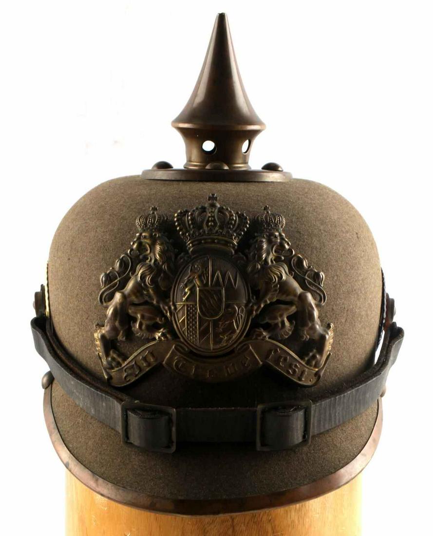 WWI IMPERIAL GERMAN BAVARIAN ERSATZ SPIKED HELMET: WWI Imperial German Bavarian Ersatz "Pickelhaube" felt spiked helmet with felt in good condition. Features German tricolor cockade on left side, and Bavarian blue & white cockade on the left side. Fro
