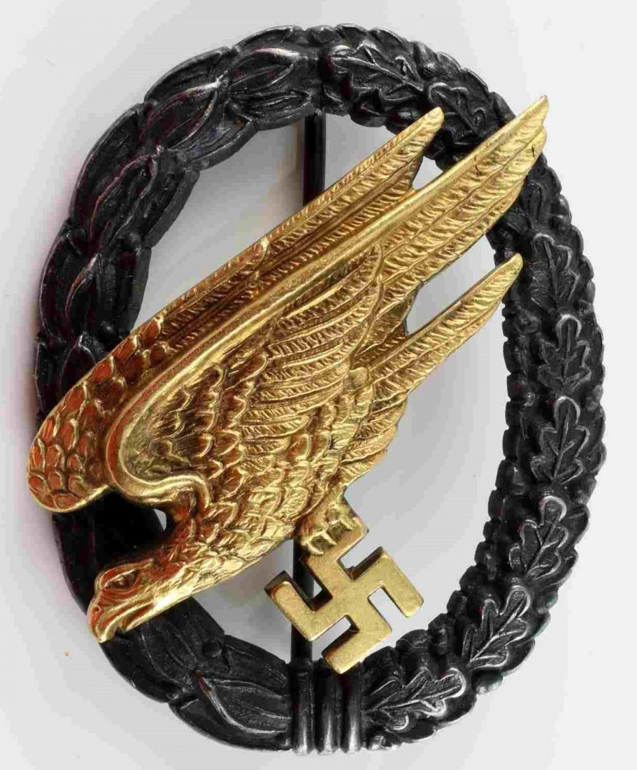 WWII GERMAN FALLSCHIRMJAGER PARATROOPER BADGE B&N: Extremely fine example B&N over L back stamp maker mark. Exceptional detail, full gilt and silver finish, thin to a point original pin.