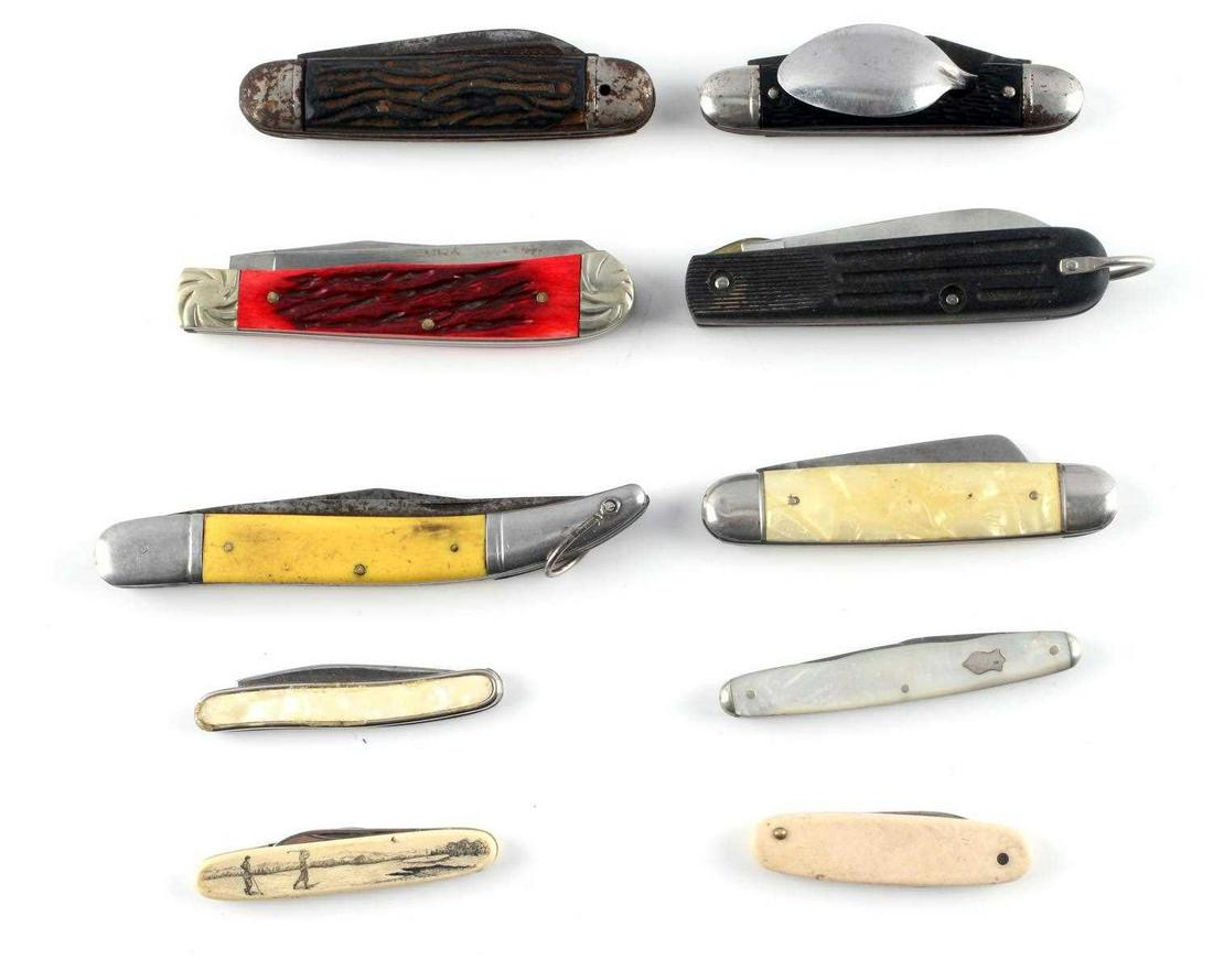 LOT OF 10 USED KNIFE MOTHER OF PEARL ANTLER: Lot includes 10 knives in fair to very good condition. Measurements range from 3 3/4 to 5 inches. Some of the handles are made of bone, mother of pearl, or antler.
