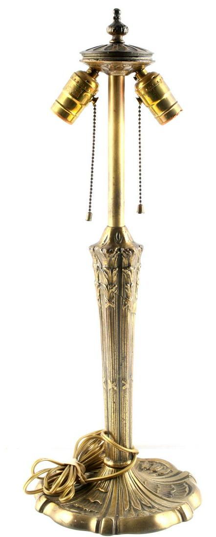 CAST IRON LEVITON VINTAGE DOUBLE SOCKET TABLE LAMP: Leviton double socket cast iron lamp with brass washed finish, featuring a Tulip and Column relief pattern with working vintage wire and plug (in very good condition).