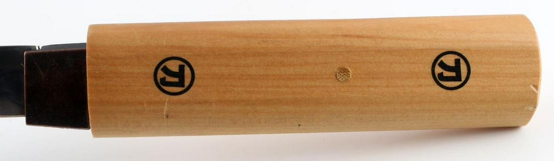 JAPANESE STAINLESS STEEL WAKIZASHI IN SHIRASAYA: Beautiful stainless steel blade made in Taiwan. Blade in shirasaya. Blade measures 15 3/4 inches. Entire piece measures 25 1/4 inches. Minor dents on the wood. Very good condition.