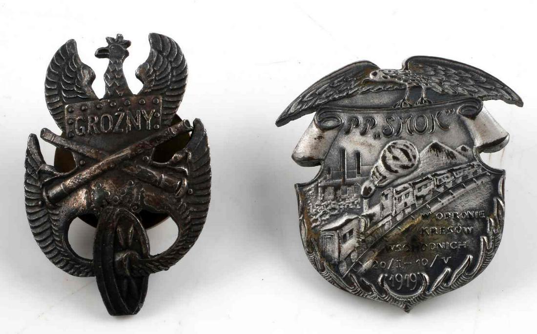 GROUP OF 2 WWII POLISH ARMORED TRAIN BAGDGES: Group of 2 WWII Polished "Armored Train" badges. Included in this group are "Smok" and a "Grozny" armored train division badges. Measure approximately 2 inches in diameter and feature a screw-back. Ma