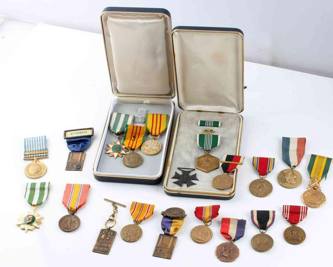 LOT OF 20 ASSORTED US ARMY MILITARY MEDALS SERVICE: Some names include: National Defense, G 8th PA Infantry, Good Conduct, Occupation of Germany, Korea, American Legion PA, Vietnam service, For Military Merit (in coffin case with rank bars), and more. 