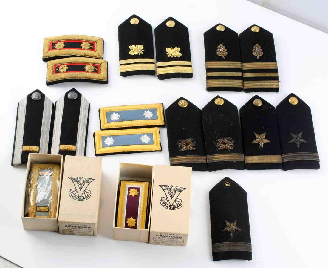 LOT OF 9 PAIRS OF US NAVY NAVAL SHOULDER BOARDS: WWII and later, Major nurse, sergeant, lieutenant, and others. Two have Vanguard boxes. Various condition. One without a match.