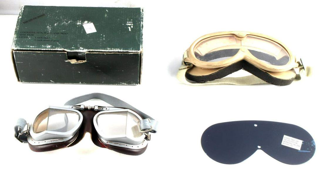 LOT OF 2 VINTAGE MILITARY SUN WIND & DUST GOGGLES: Lot of 2 military NSN 8465-02-6052 sun, wind, and dust goggles. Comes with an extra ballistic lens. In original box. Both goggles have an adjustable strap so that one size fits all. Measure approximat