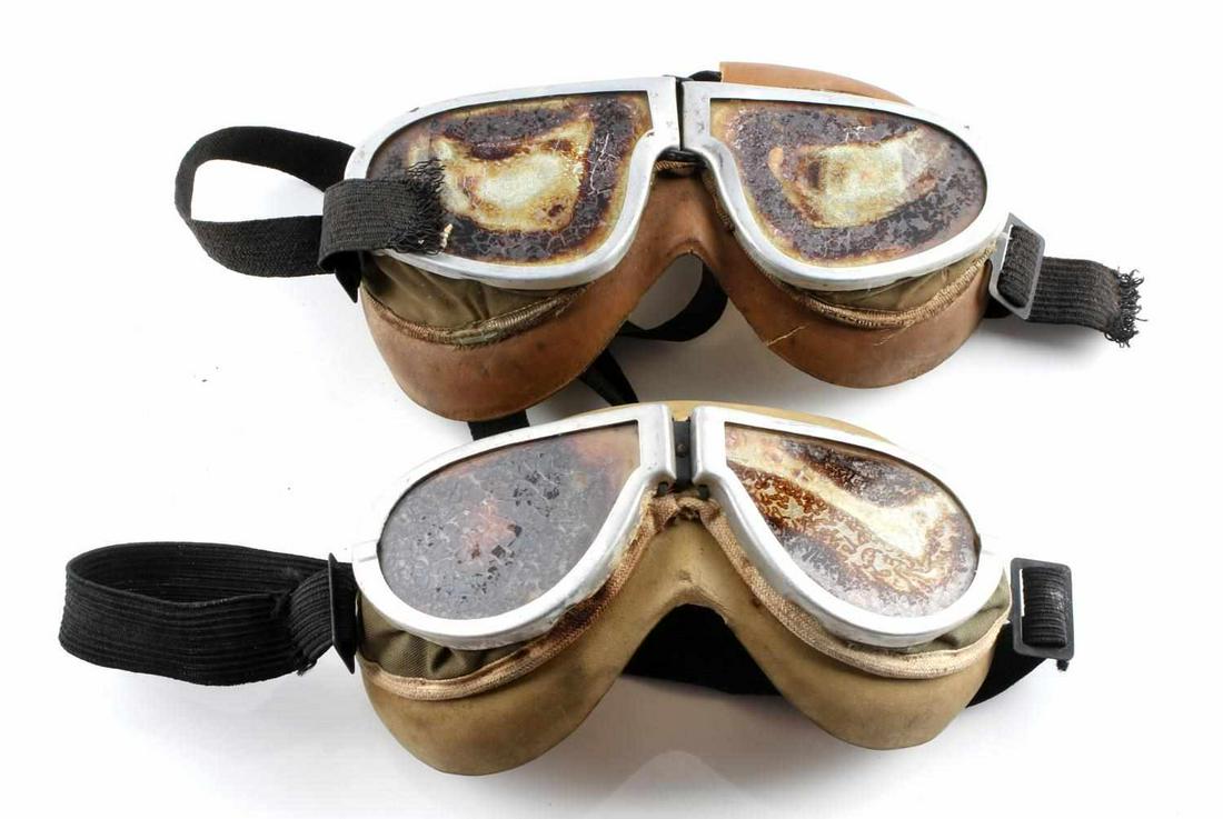 WWII US ARMY AIR CORPS AVIATOR GOGGLES LOT OF 2: Rubber, cloth, and aluminum construction with elastic band. Very worn with crystallization to lenses, one has torn rubber. Collector condition.