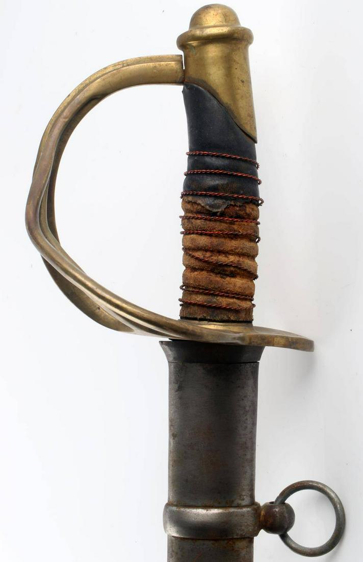 CIVIL WAR CONFEDERATE STATE ARMY CAVALRY SWORD: Confederate States Army cavalry wrist breaker sword Measures 42 1/2 inches overall. Slight rusting on blade, scabbard, and grip. Loss of leather on grip. C.S.A. V.A. 17 stamped on hand guard. Very goo