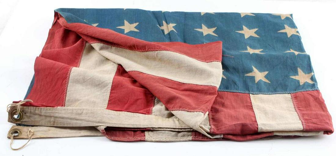 LARGE VINTAGE ORIGINAL 48 STAR AMERICAN FLAG: Large, impressive flag measuring 42.25 X 66.75 inches. In good condition with wear commensurate with age & use.