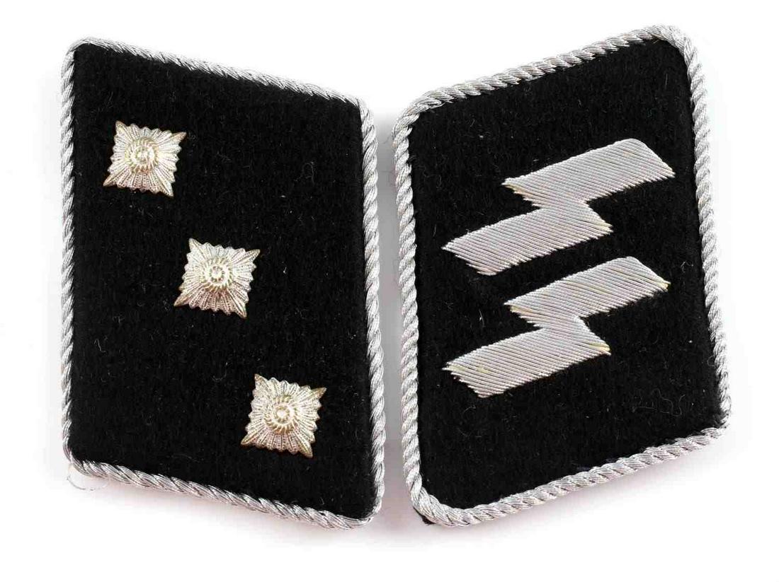 WWII THIRD REICH GERMAN SS OFFICERS COLLAR TABS: One tab with 3 rosettes (2nd Lieutenant) and one tab with SS runes. Very good condition. Unauthenticated, sold as is.