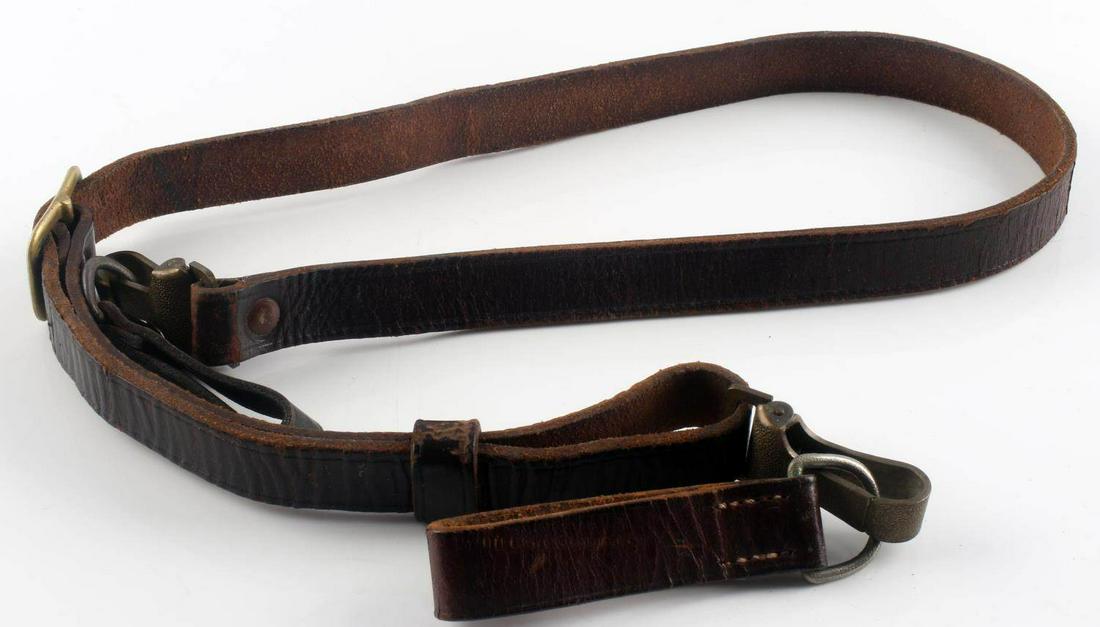 WWII GERMAN REICH NSDAP CROSS STRAP W BELT LOOPS: WWII German Reich leather NSDAP/perhaps SA cross strap with belt loops which have a maker's mark. In good condition.