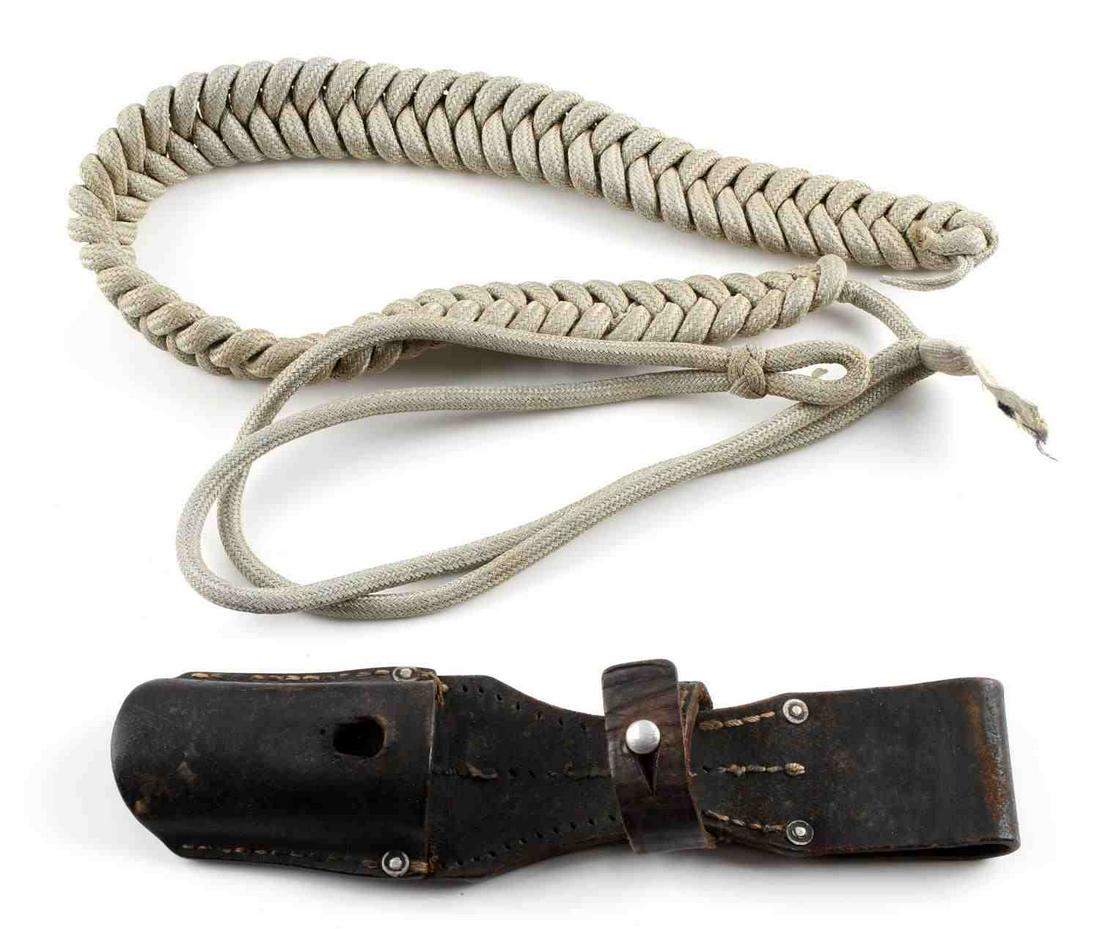 WWII GERMAN THIRD REICH AIGUILLETTE K98 FROG: Lot includes a Third Reich aiguillette and k98 bayonet frog. Aiguillette measures 40 inches. Frog measures 9 1/4 x 2 1/4 inches. Very good condition.