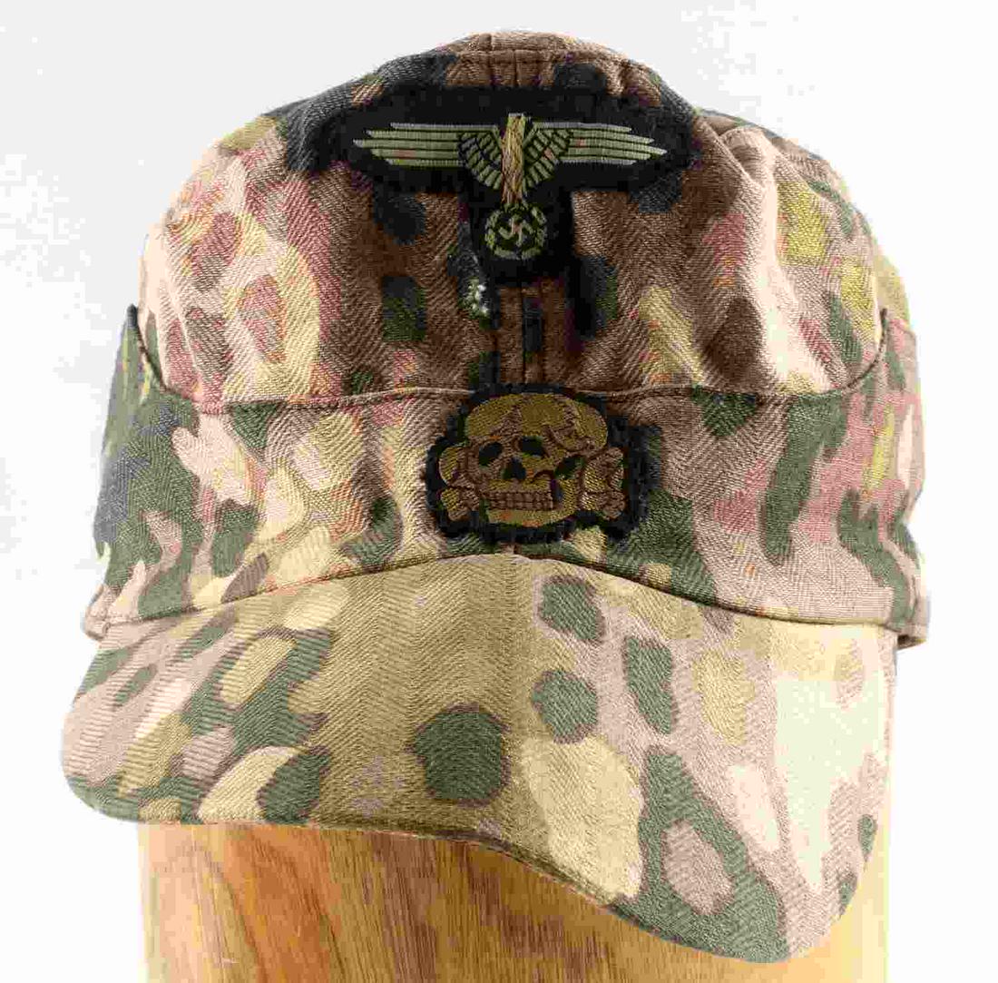 WWII GERMAN THIRD RIECH CAMO SS PANZER M43 CAP: Third Reich dot pattern camo M-43 cap. Cap and Parteiadler fluoresce. Totenkopf does not fluoresce. Tip of visor to rear of cap measures 12 inches. Very good condition. No interior markings. Unauthent
