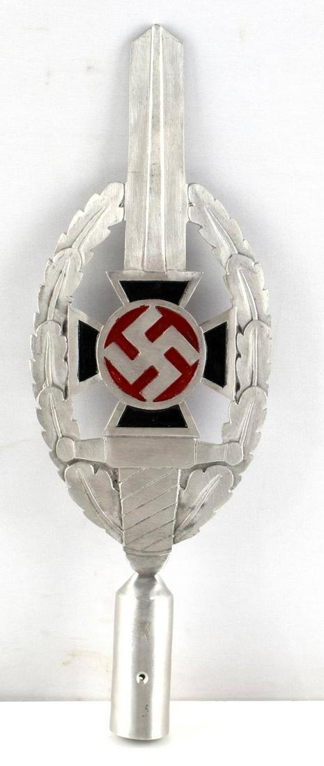 WWII GERMAN THIRD REICH NSKOV FLAG POLE TOP: WWII German NSKOV flag pole top. Measures 14.5 X 5 inches. Very fine condition. Unauthenticated, sold "as is". This lot has a reserve.