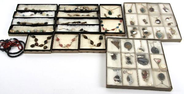 LARGE DEALER LOT OF NATURAL STONE JEWELRY: LARGE DEALER LOT OF NATURAL STONE JEWELRY Over 35 pieces of jewelry made from Mother of Pearl, etc. and including chains, bracelets and pins. Most in boxes. EST $100-200
