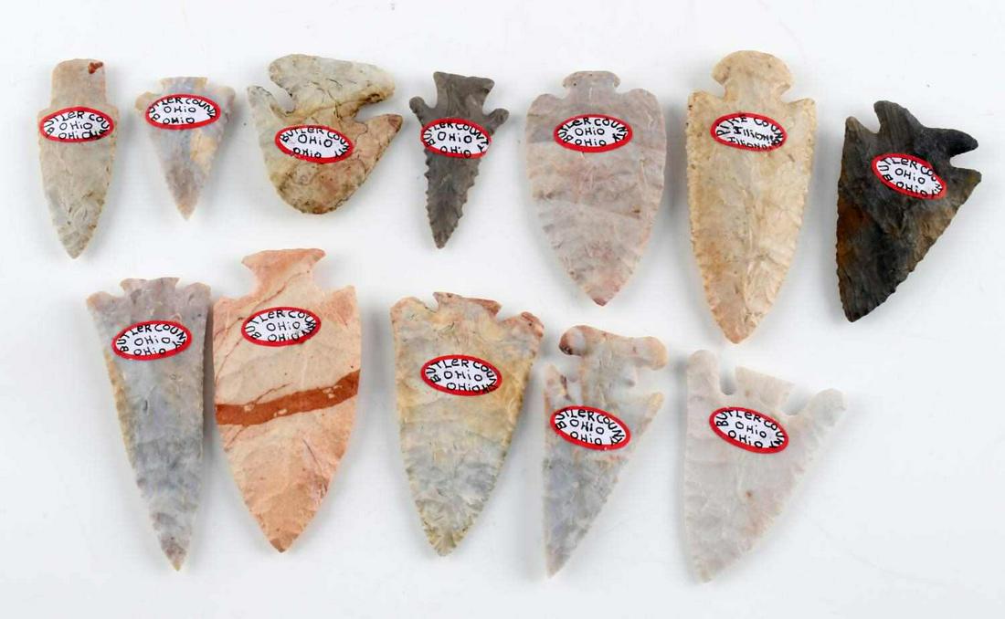 NATIVE AMERICAN FOUND ARROWHEAD LOT OF 12 ARCHAIC: Riker mounted arrowheads. Variety of shapes and materials. Archaic - Woodland period. Corner notched, side notched, contracting stem, and more. 2-4 inches. Very good condition.
