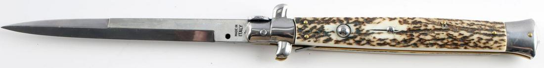 WOOD ANTLER AKC ITALIAN MADE SWITCHBLADE 13 INCHES: AKC Italian Made Switchblade 13 inches overall opened. Blade is made of stainless steel. Spear point blade. Very good condition.