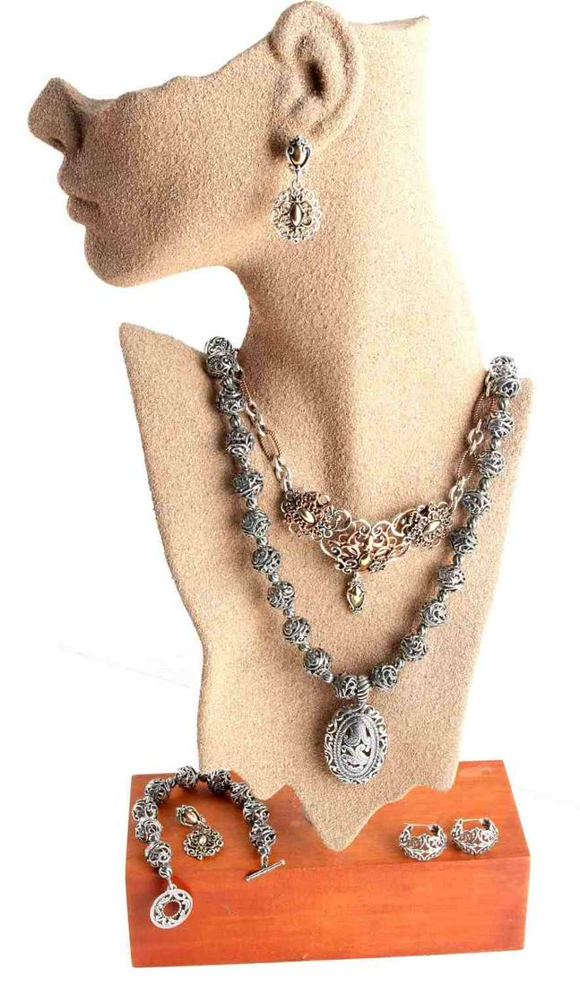 SOUTHWESTERN NAVAJO INDIAN JEWELRY BY POLLACK: Designer sterling silver, brass and bronze jewelry created by Navajo silver artisan Carolyn Pollack. Gorget style scrolling necklace has a magnetic clasp, signed CP, .925 with Relios stamp. Length of