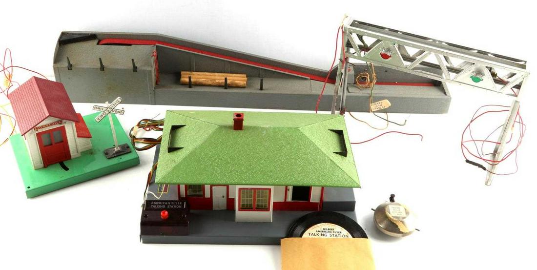 AMERICAN FLYER TALKING STATION LIONEL LUMBER LOADE: All new in box, Lionel No. 145 automatic gateman, Junior Bridge Co. No. 401 signal bridge, Lionel Lumber Loader, and American Flyer No.755 Talking Station.