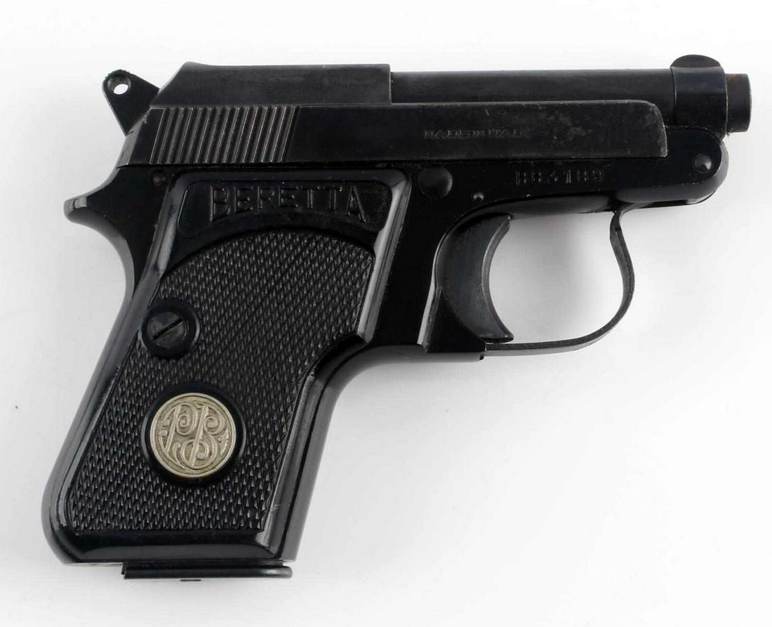 BERETTA MODEL 950 SEMI AUTO POCKET PISTOL 6.35 MM: Blued steel, bakelite grips, 2.5 inch tip-up barrel, bright clean bore, maker and model marked to left side slide, 1958 PSF and other proof marks to left side frame behind grip, Made in Italy marked t