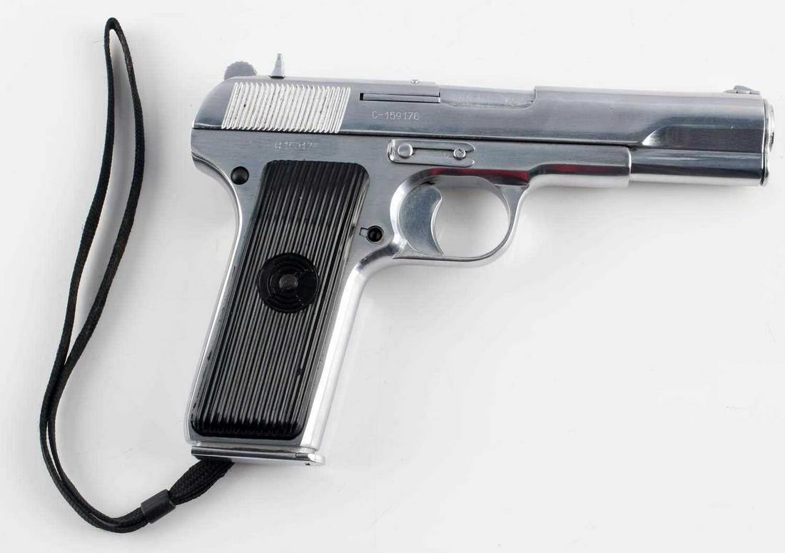 YUGO ZASTAVA M57 NICKEL SEMI AUTO PISTOL 7.62 MM: Nickel finish, maker, importer, model, and caliber marked to left side slide, serial number marked to right side three times, grooved bakelite grips, fixed front and dovetail rear sights, 4.5 inch bar