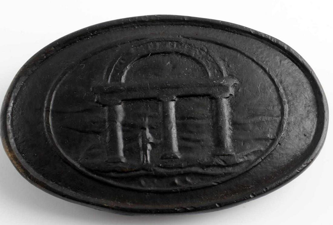 CIVIL WAR CONFEDERATE ARMY GEORGIA EM BELT BUCKLE: Confederate Army Georgia enlisted man's belt buckle. Features the Georgia seal on the front. Measures approximately 2 X 3.25 inches. 3 prongs on the reverse for attaching to a belt. Stamped brass cons