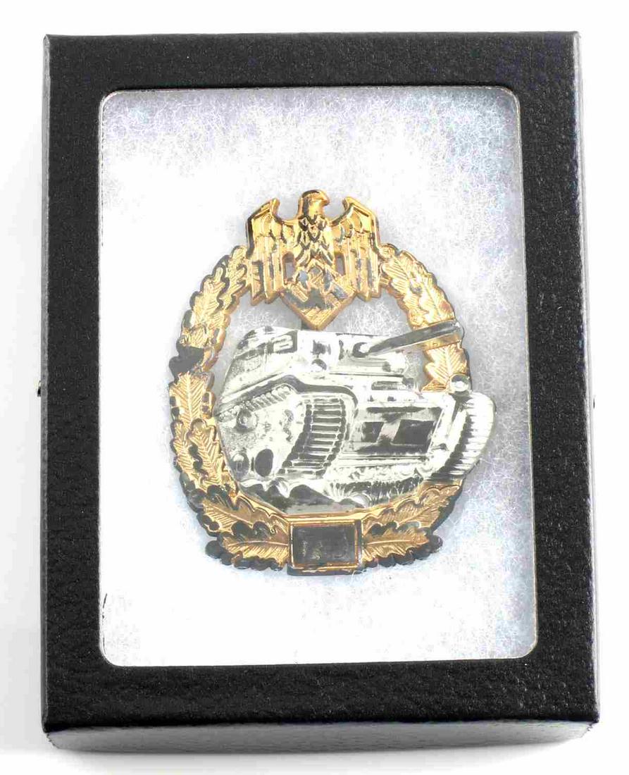 WWII GERMAN THIRD REICH PANZER ASSAULT BADGE: WWII German cased Panzer assault badge for 75 engagements. Measures approximately 2 X 2.5 inches and features a 180 degree pin lie and a 'c' catch hook on the reverse. Very good condition overall with