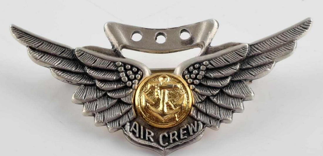 STERLING US NAVY VIETNAM ERA NAVAL AIR CREW WINGS: USN Vietnam Era Naval Air Crew Navy Wing. Measures 2 X 15/16 tall. The front reads ‘Air Crew’. There is an anchor in the center flanked by a wing on each side. The reverse is maker marked ‘22-M 