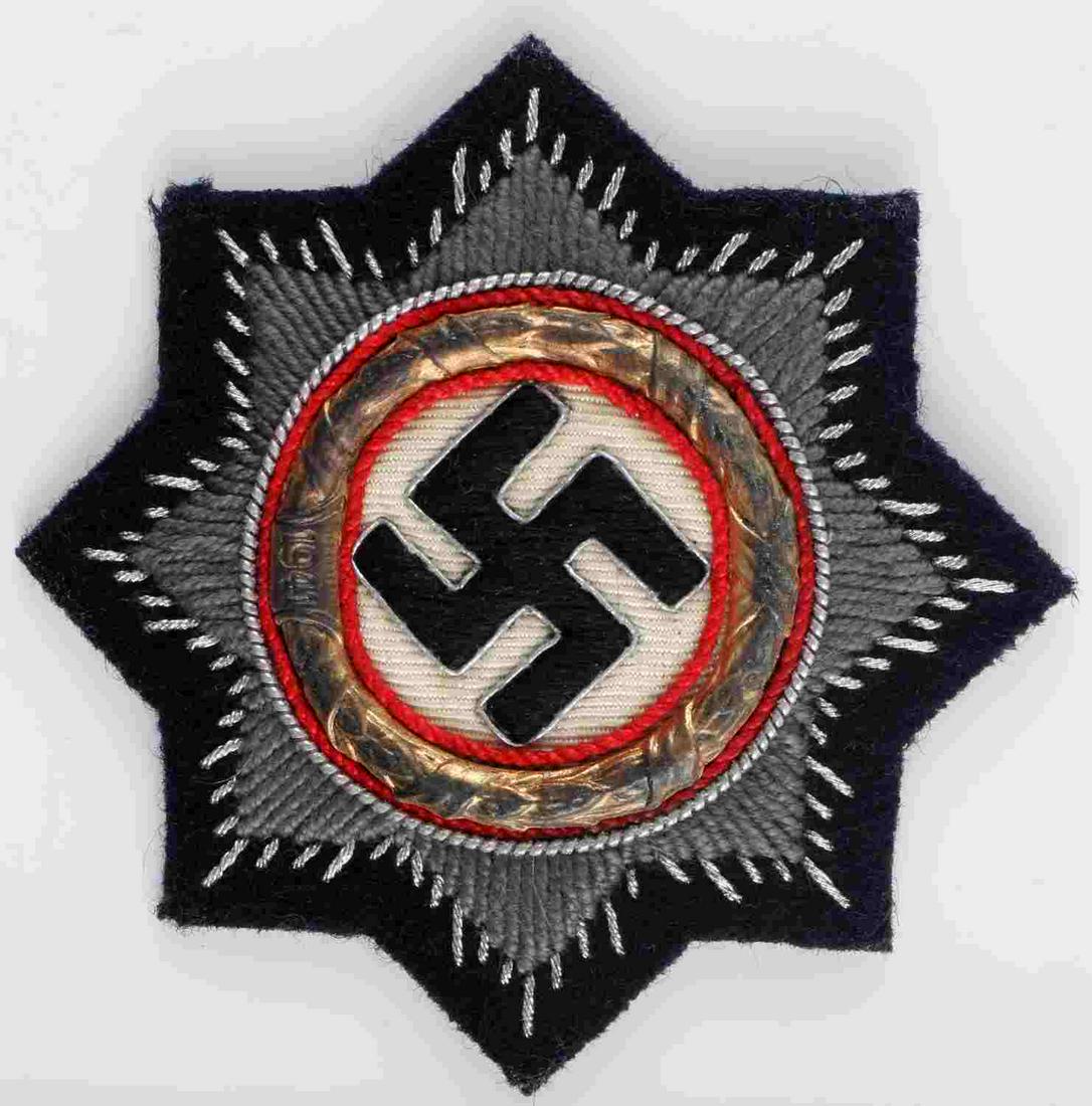 WWII GERMAN THIRD REICH SS PANZER GERMAN CROSS: WWII German Third Reich "SS" Panzer German Cross. Measures 3 X 3 inches. Marked with "1941." Does not fluoresce. In good condition. Unauthenticated, sold as is.