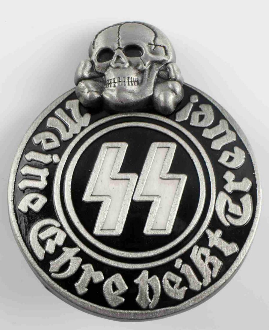 WWII GERMAN THIRD REICH WAFFEN SS PARTY PIN: German World War II Waffen SS Membership Party Badge. Measures 1 1/8Â” wide by 1 5/16Â” tall. The front reads Â‘Meine Ehre heist Treue!Â’ (My Honor is Loyalty!). The reverse is maker marke