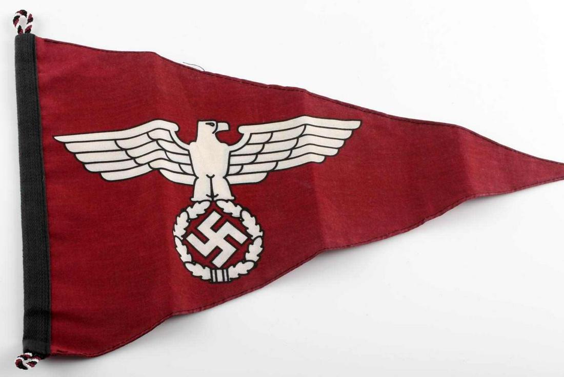 WWII GERMAN THIRD REICH LEADER CAR PENNANT FLAG: German WWII Political Leader Officers Staff Car Pennant. Measures 13” wide by 8 5/16” tall. Shows a German Political eagle clutching a swastika in his talons. Has a black cotton bunting with two e