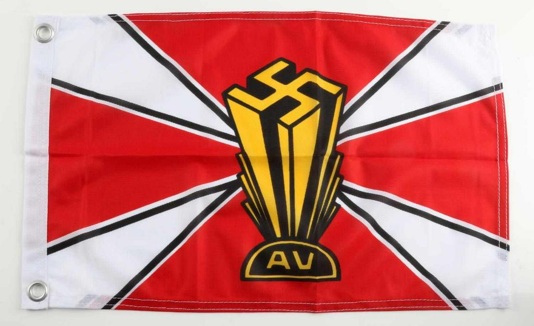 WWII GERMAN AMERICAN BUND AV SWASTIKA BANNER FLAG: Measures 19 X 11 3/4 inches. The front shows a swastika in the center with the letters ‘AV’ at the base. Both are surrounded by red and white rays. There is a white cotton bunting with two brass g