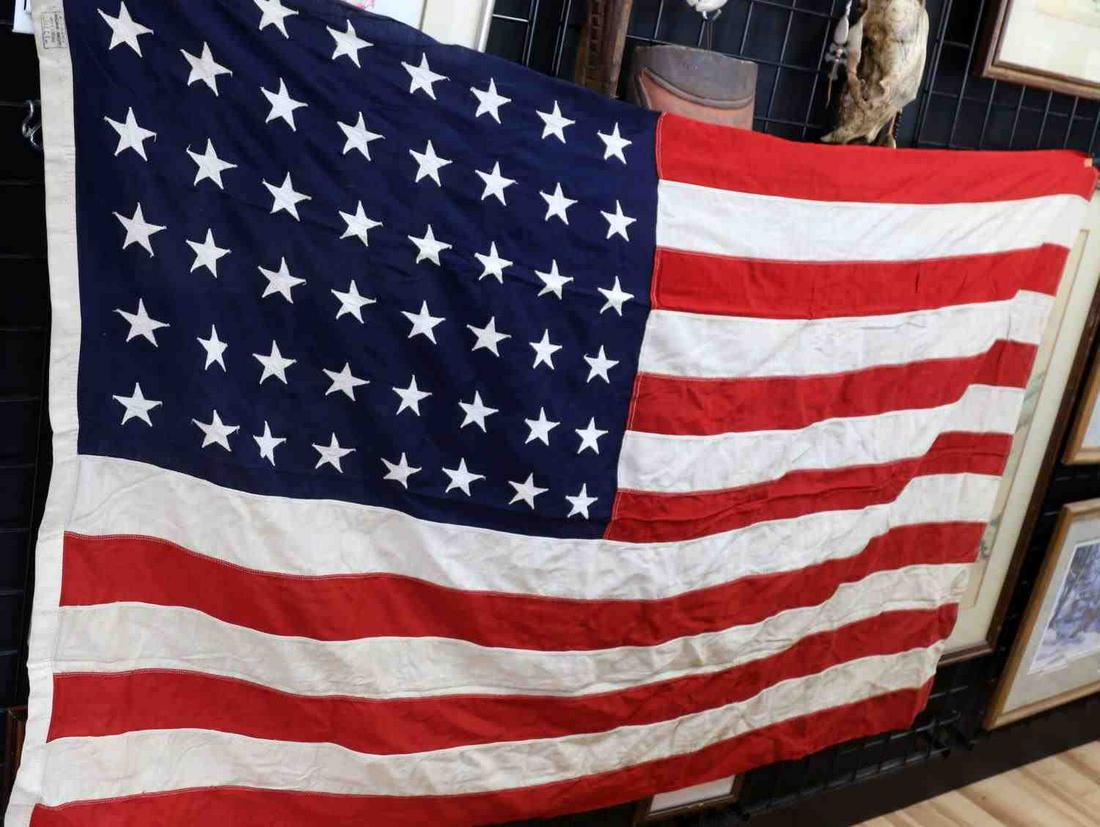 WWII 48 STAR UNITED STATES U.S. FLAG 4 X 6 FT FLAG: Very good individually sewn star flag, free of repairs, stains or damage.