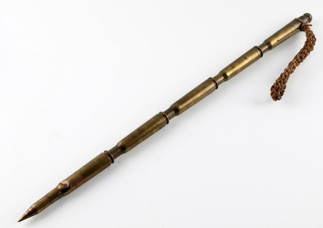 TRENCH ART 50 CAL MACHINE GUN BULLET SWAGGER STICK: Very nice leather lanyard, 5 stacked machine gun rounds, measures 22 inches.