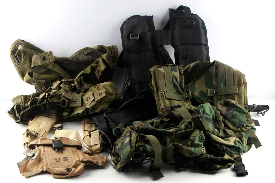 LOT OF 3 US TACTICAL VESTS PLUS STRAPS AND POUCH: Two camo tactical vests, one larger black tactical vest, and beige backpack straps and US marked pouch. All in good condition.