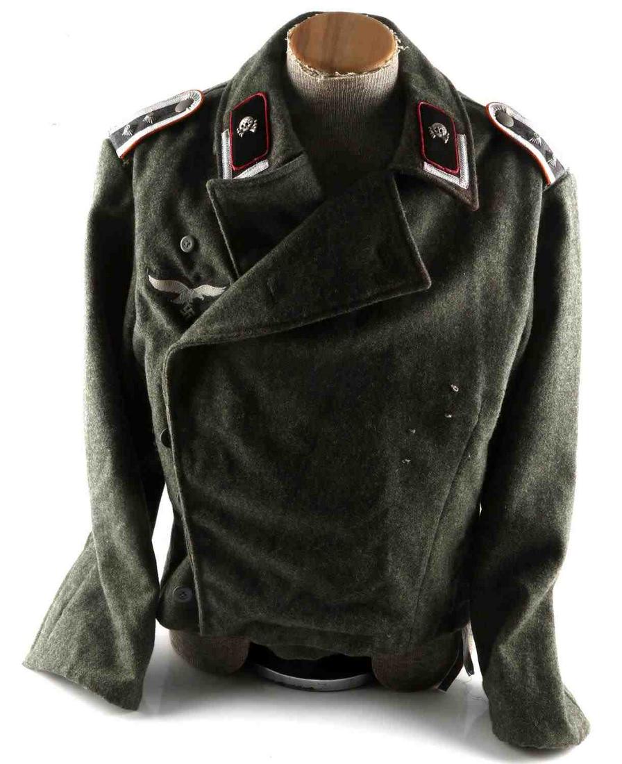 WWII GERMAN THIRD REICH SS PANZER DIV. NCO TUNIC: NCO Tunic with light mothing confined mostly to sleeves, Panzer Division Totenkopf collar insignia, does not fluoresce, shoulder straps lightly fluoresce, left inside has numbers including B41, tunic 
