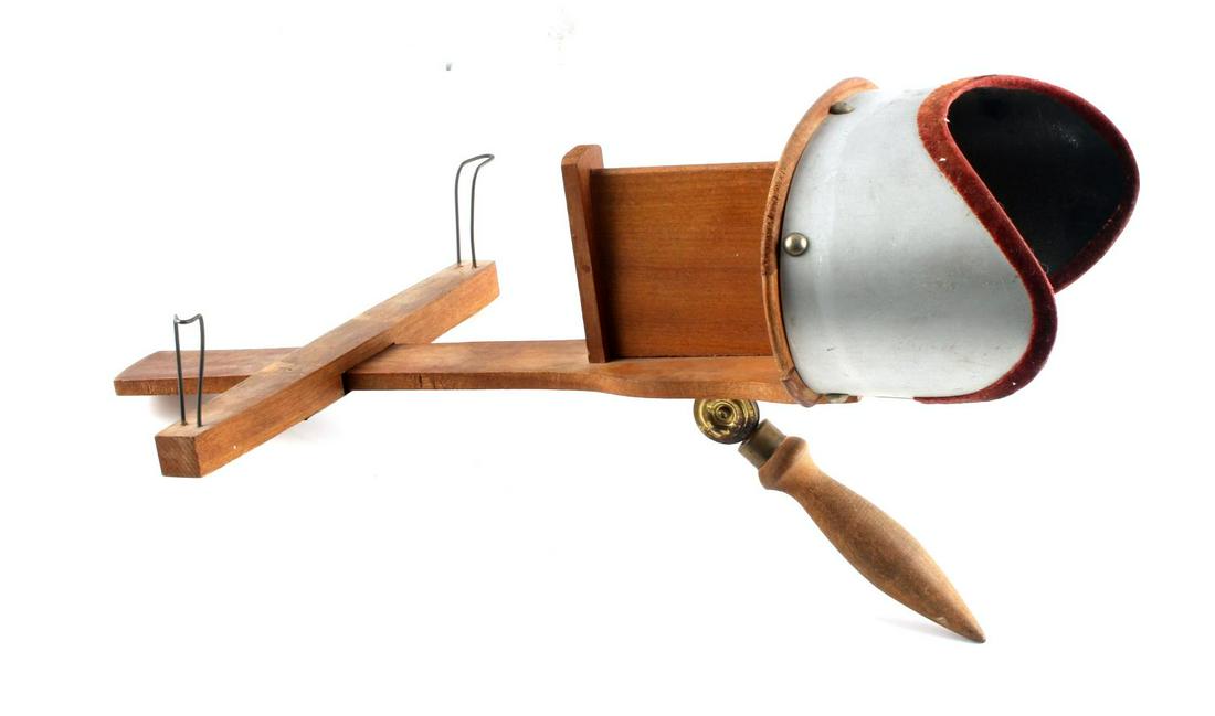 ANTIQUE STEREOSCOPE VIEWER WOOD AND ALUMINUM: Glass optic piece is loose, otherwise good condition. Measures 13 inches long.