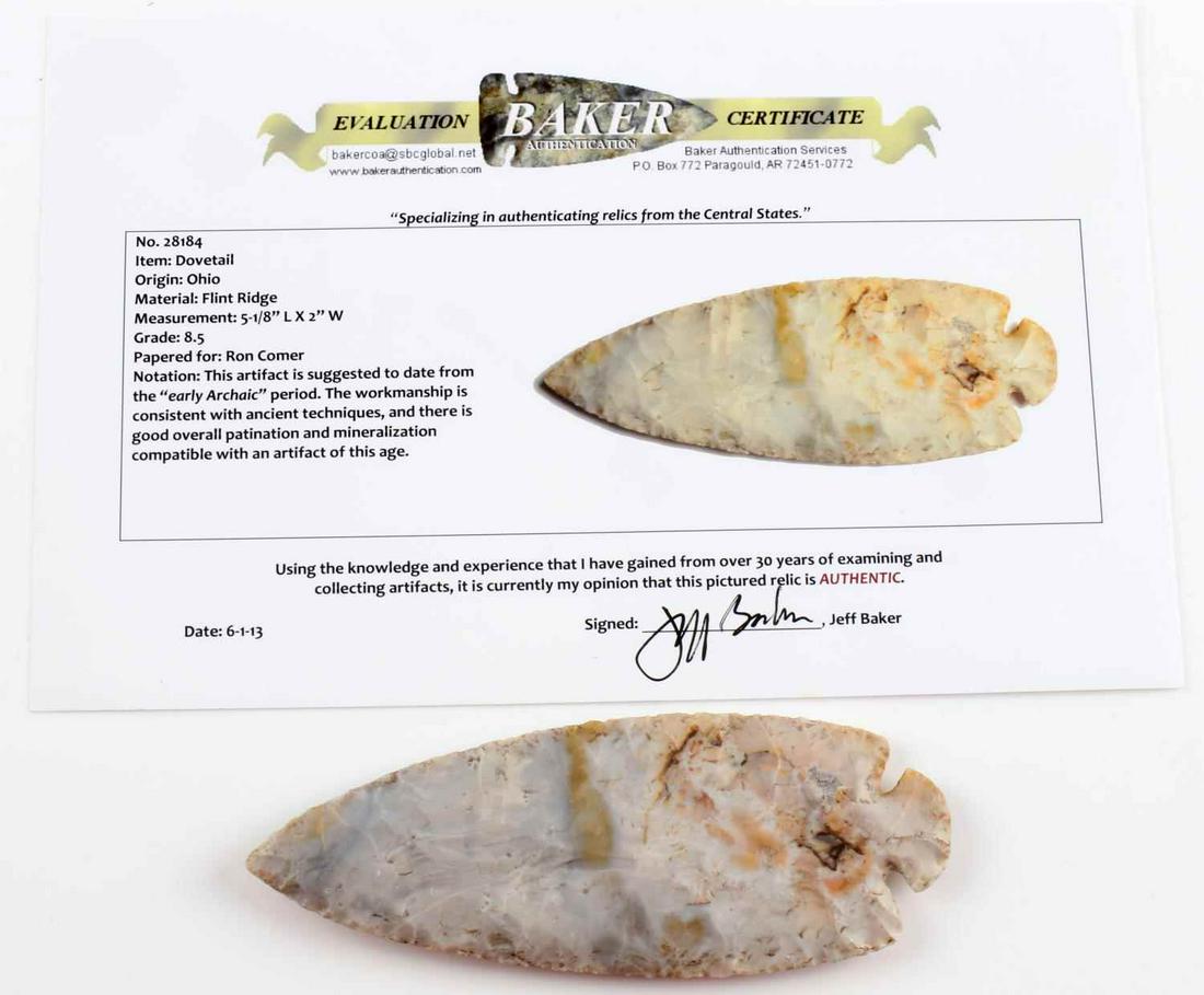 NATIVE AMERICAN ARCHAIC PERIOD DOVETAIL ARROWHEAD: Native American Archaic period dovetail arrowhead crafted from flint. Comes with COA. Measures 5 1/8 x 2 inches. Nice even auricles and base.