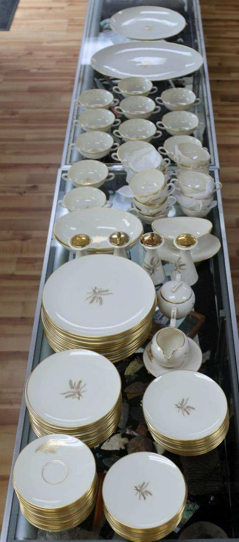 110 WHEAT BY LENOX R-442 VINTAGE PORCELAIN CHINA: Lot of 110 "Wheat" by Lenox R-442 Porcelain Dinnerware. Includes: 16 saucers, 17 teacups, 12 bread and butter plates, 13 salad plates, 16 dinner plates, 12 dessert plates, 2 sets of salt shakers and p