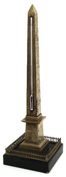 ANTIQUE GRAND TOUR BRASS OBELISK THERMOMETER: A 19th century souvenir 17 inch brass thermometer designed after the obelisk of Luxor which was given to the French in 1829 by the viceroy of Egypt. Piece is in very good condition.