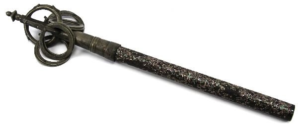 BUDDHIST MONKS PRAYER RATTLE: Antique prayer rattle of probably Japanese origin (although not marked). Lacquered stem with mother of pearl chip inlay. Brass head with 8 brass rings. Approximately 20 inches in length.