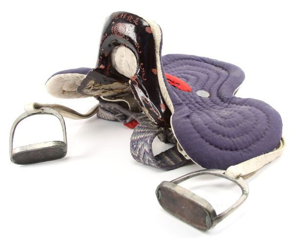 LATE 19TH CENTURY CHINESE SADDLE: Brought back after WWII by a "Burma Hump" crew member, this saddle frame is believed to be from the late 1800's or early 1900's. The frame is wood with hide stretched and laced over it, then lacquered