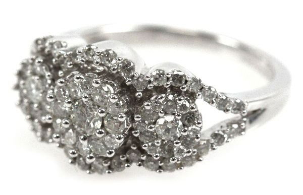 10K WHITE GOLD DIAMOND CLUSTER COCKTAIL RING: 1 Tcw. . Size: 7.25 . Weight: 4.1g . Condition: Very good, missing 1 small diamond.
