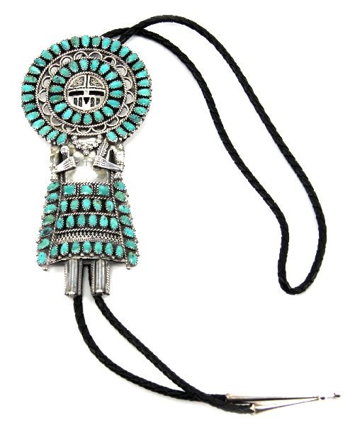 STERLING SILVER TURQUOISE SUNFACE KACHINA BOLO: Navajo Indian Turquoise Sterling Silver Sunface Kachina Bolo Tie. Larry Moses Begay, signed "LMB" to the rear. 5.5 inches. Leather chord with silver finials.