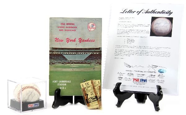 1963 NEW YORK YANKEES SIGNED BASEBALL: Containing 22 signatures of the 1963 New York Yankees including Roger Maris, Mickey Mantle, Joe Pepitone, and Ed Ford. Ball is accompanied by a letter of authenticity from PSA, a 1963 Yankees' Officia