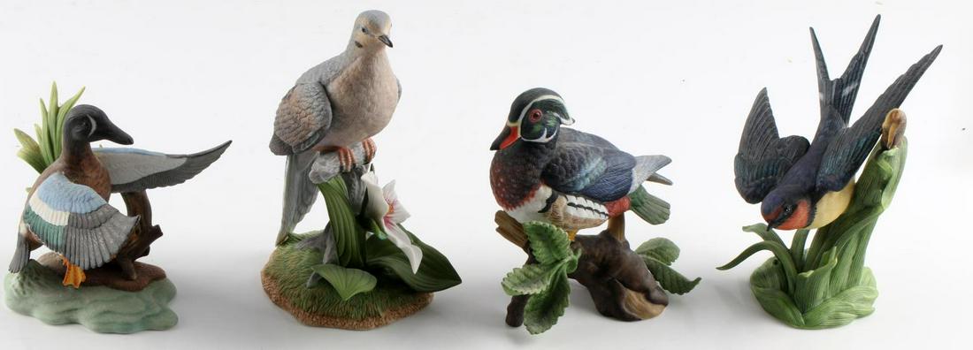 LENOX PORCELAIN DOVE WOOD DUCK & SWALLOW FIGURINES: Lot of 4 each marked Lenox fine porcelain. First is the 1999 Mourning Dove , 6x4 inches with non distracting chip to a leaf. Second is the 1990 Wood Duck, 4 1/2 x 4 1/2 inches. Next 1992 Blue Winged T